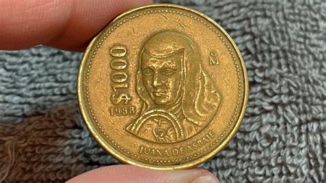 what is a 1000 peso coin worth